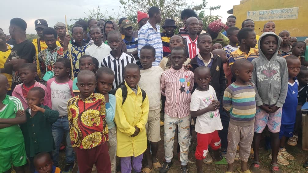 Children and community members gathered in Bibogobogo