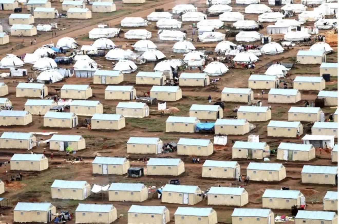 Aerial view of temporary shelters in a displacement camp